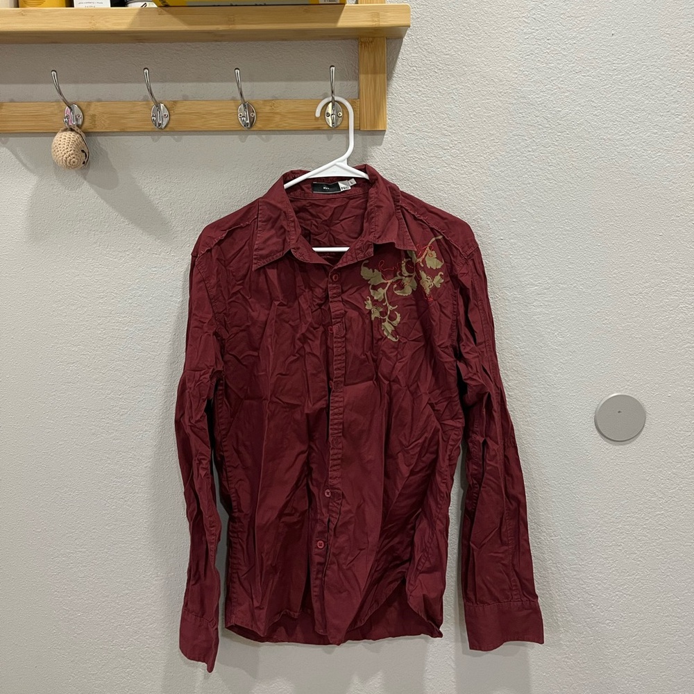 Red button-down with gold trimming pattern